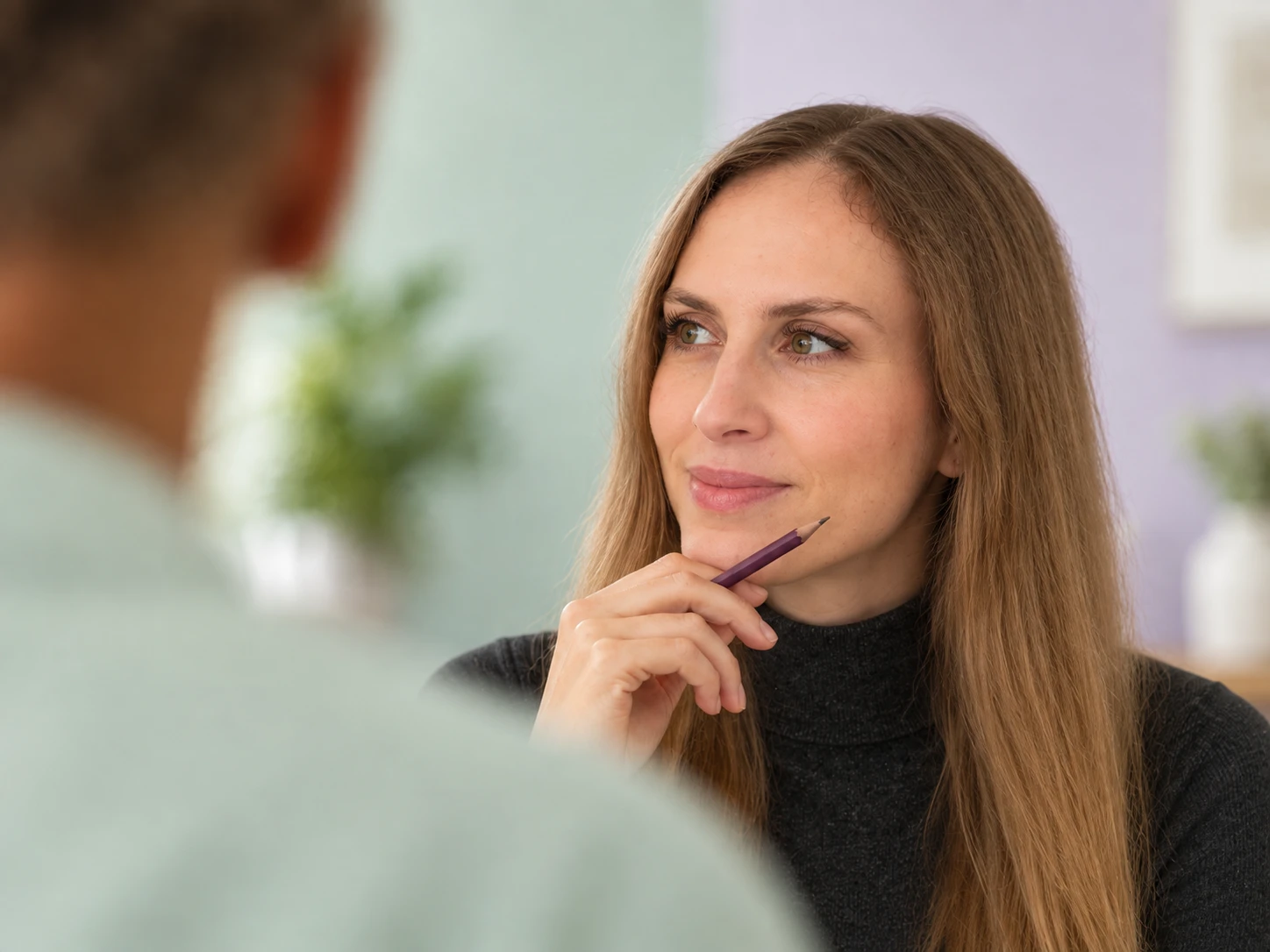 Illustrative edited scene of Olivia Serafin in conversation.